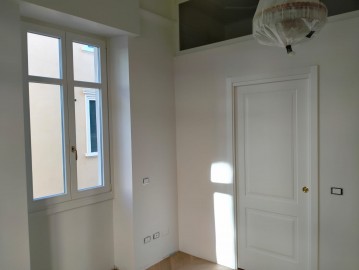 Efficientamento Energetico di un Palazzo di Pregio a Verona: Infissi in Legno e Domotica