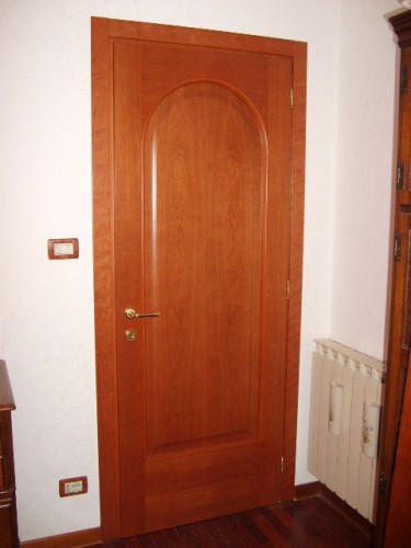 Porte interne con pannello arcato in Ciliegio